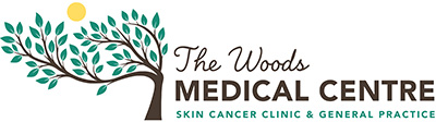 the woods medical clinic logo